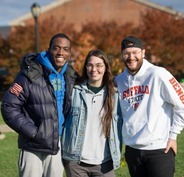 Three Students Smiling